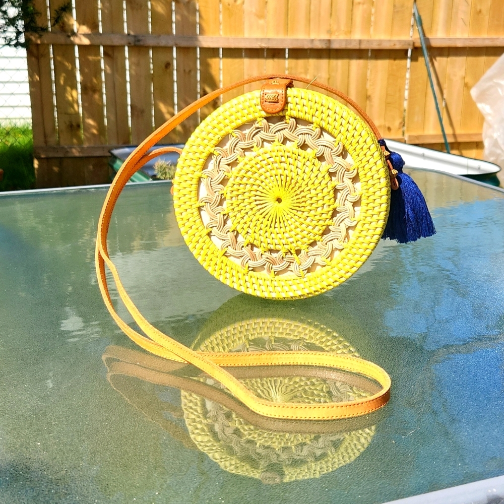 Round Basket Weave Purse, yellow w/ navy tassle and adj. Leather strap like new
